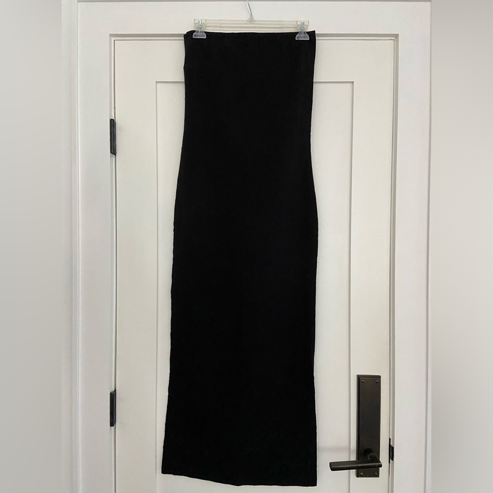 Sculptured strapless dress.